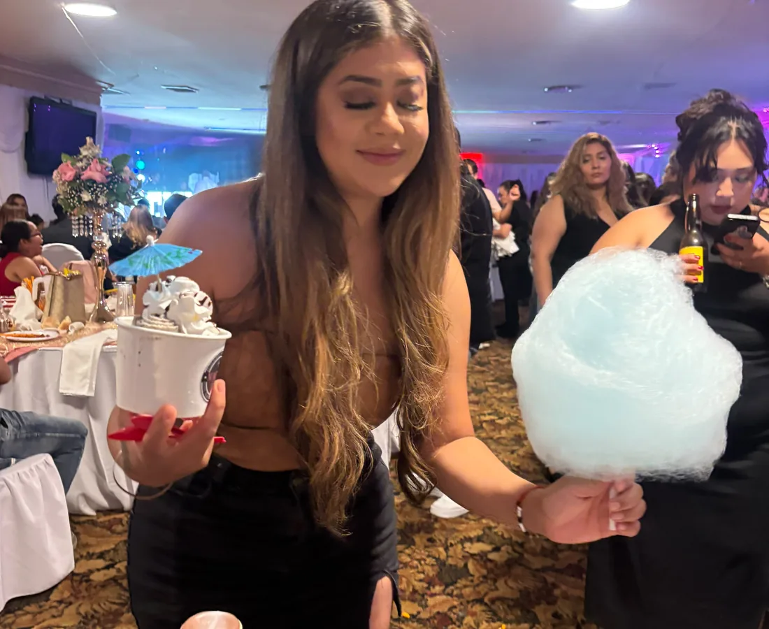 Cotton candy and rolled ice cream at an event